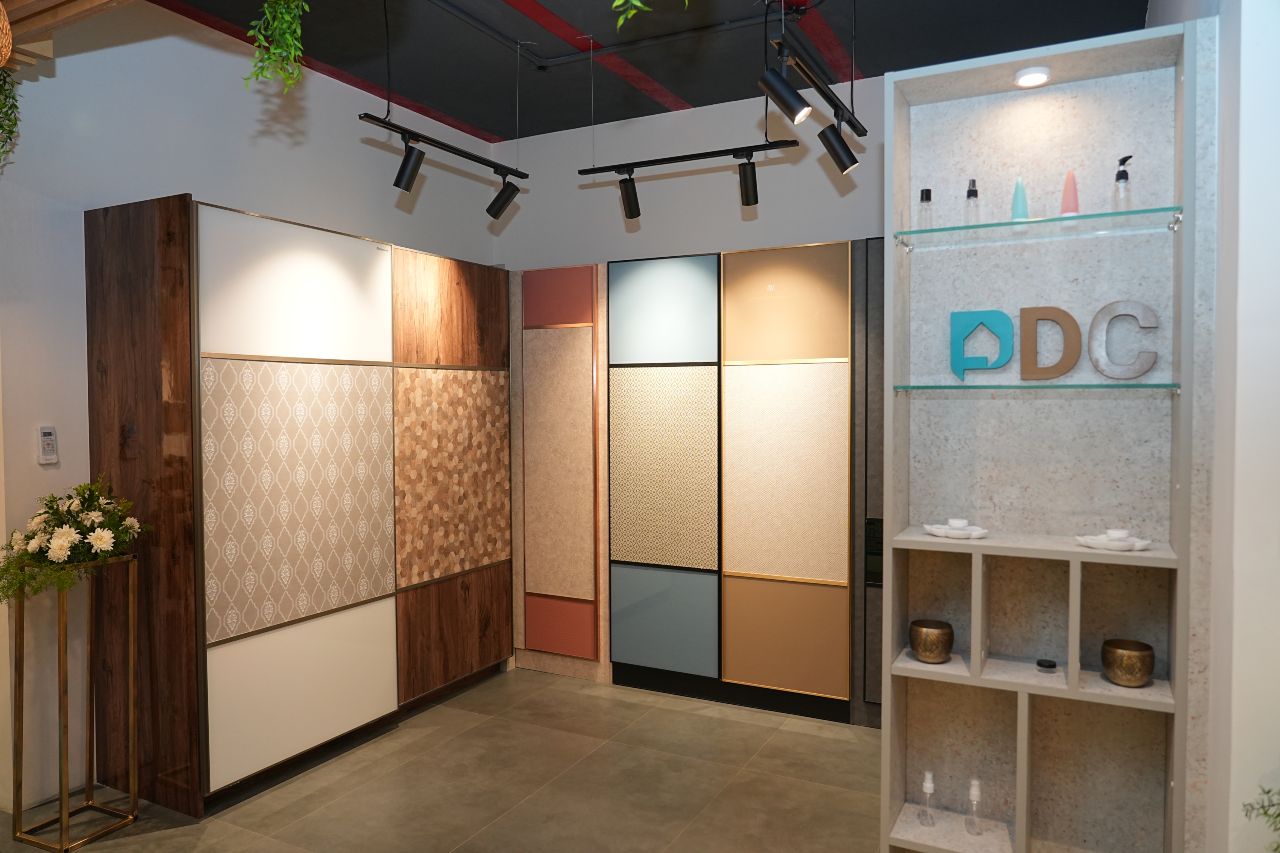 Sleek wooden wardrobe design displayed at DesignCafe in Hebbal, illustrating modern storage solutions.