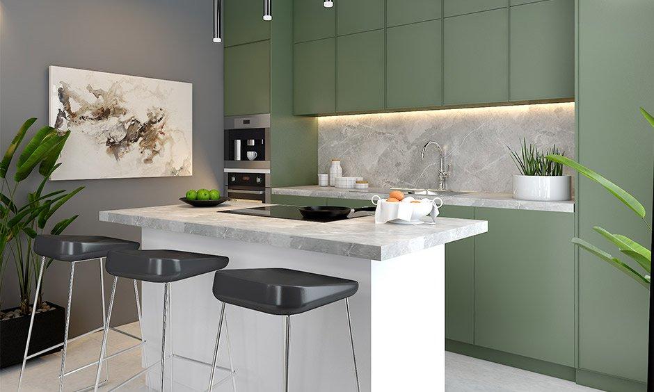 Spacious Italian kitchen interior with marble countertops, wooden cabinets, an island, pendant lights, and terracotta tiles.