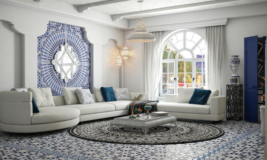 Rent home decorating ideas: a living room with layered rugs on neutral flooring, adding cosy texture.