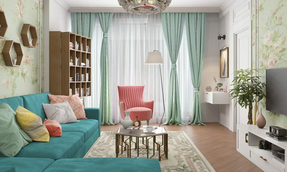 Styling rental house decor with a vibrant rug and art to personalise a neutral living room.