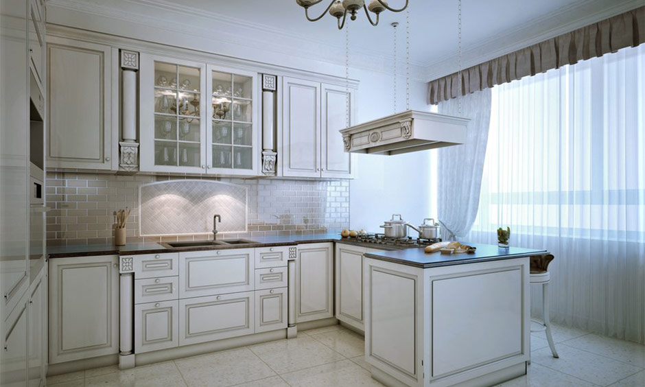 Beautiful kitchen curtain idea: sheer white curtains filter sunlight while enhancing an apartment's decor.