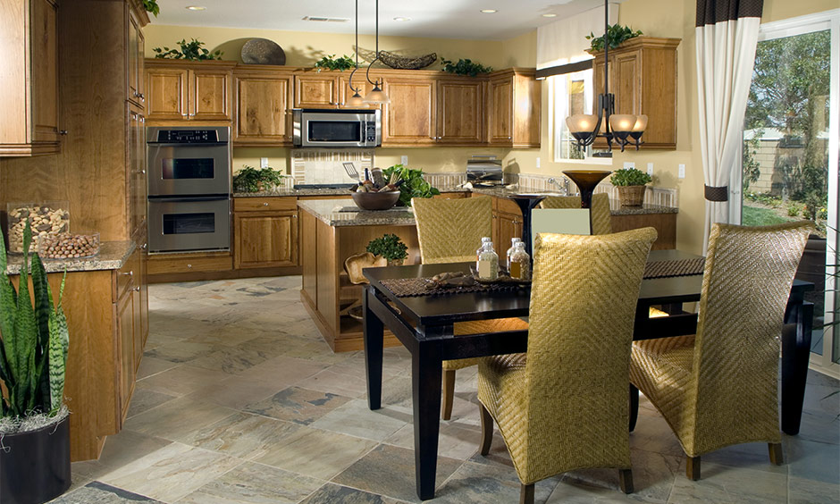 Cream vitrified tiles texture offers both slip resistance and style, ideal for a kitchen floor.