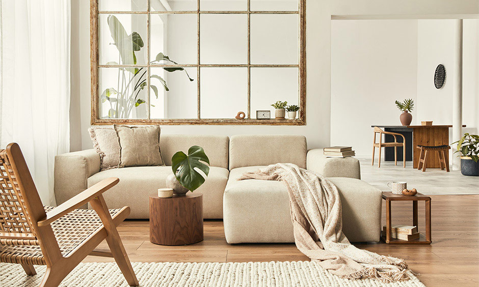Modern boho chic minimalist apartment living room with wooden furniture and warm earthy tones.