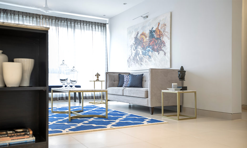 Elegant, modern minimalist apartment living room with sleek furniture and stylish artwork.