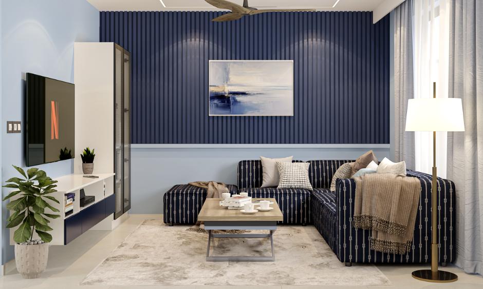 Light blue and dark blue combination features navy trims and furniture for a cool, stylish Indian bedroom.