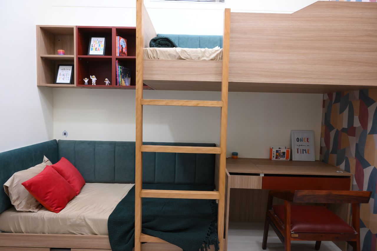 Colourful kids room design by DesignCafe Ahmedabad, combining fun and functionality for children.