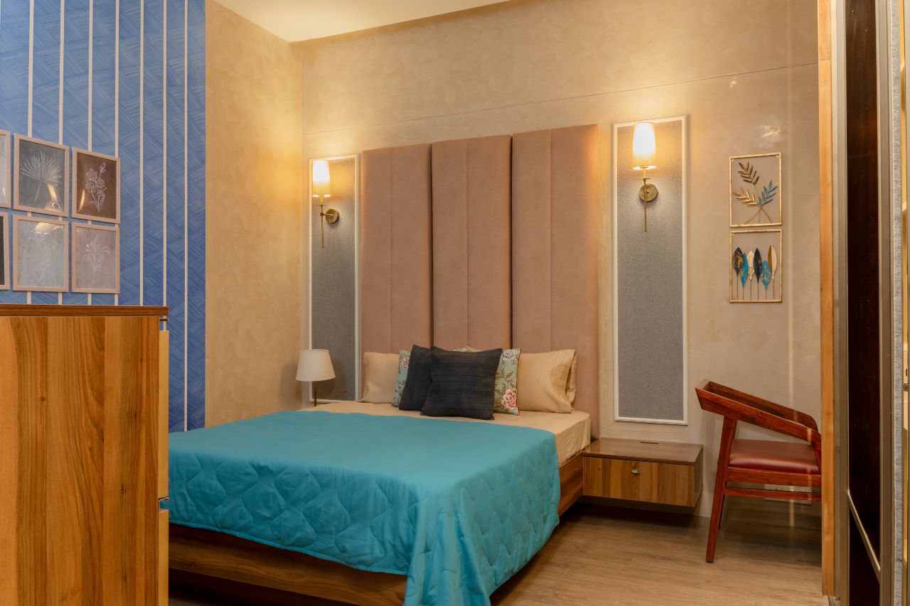 Elegant master bedroom design by Ahmedabad designer, blending style and comfort in Gujarat.