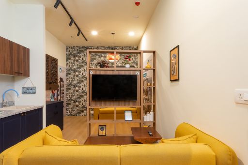 Stylish living room featuring a swivel unit model by DesignCafe, enhancing versatility and design.