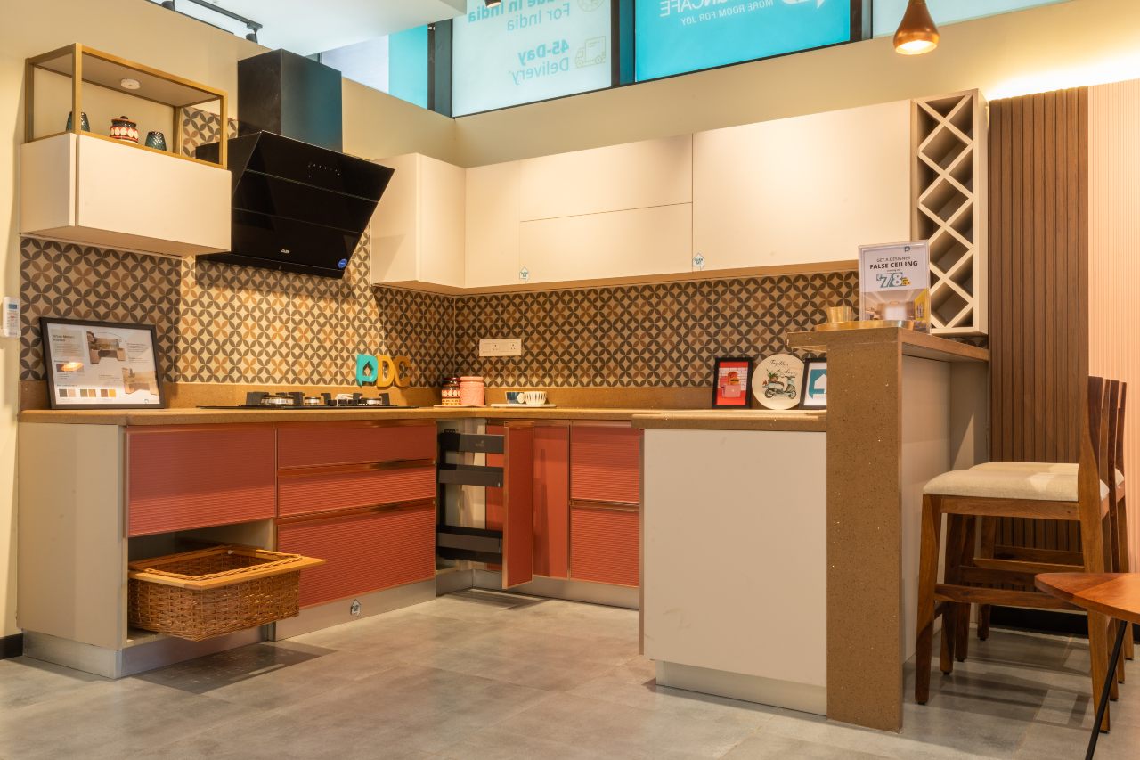 Chic modern kitchen in U-layout design at DesignCafe Pune, optimizing space and functionality.