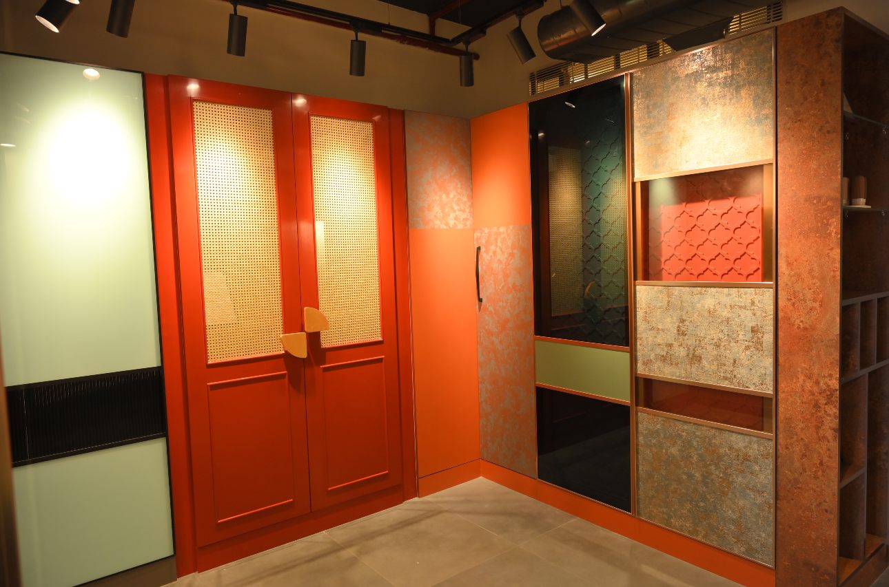 Stylish laminated wardrobe design showcased at DesignCafe studio, perfect for modern interiors.