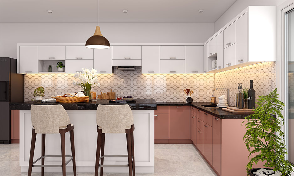 Modular kitchen platform with black granite kitchen platform material, white cabinets, and pastel drawers.