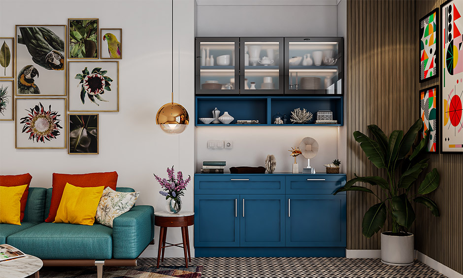  Interior design in Bhubaneswar featuring a vibrant living room with storage cabinets, wall art, and stylish seating.