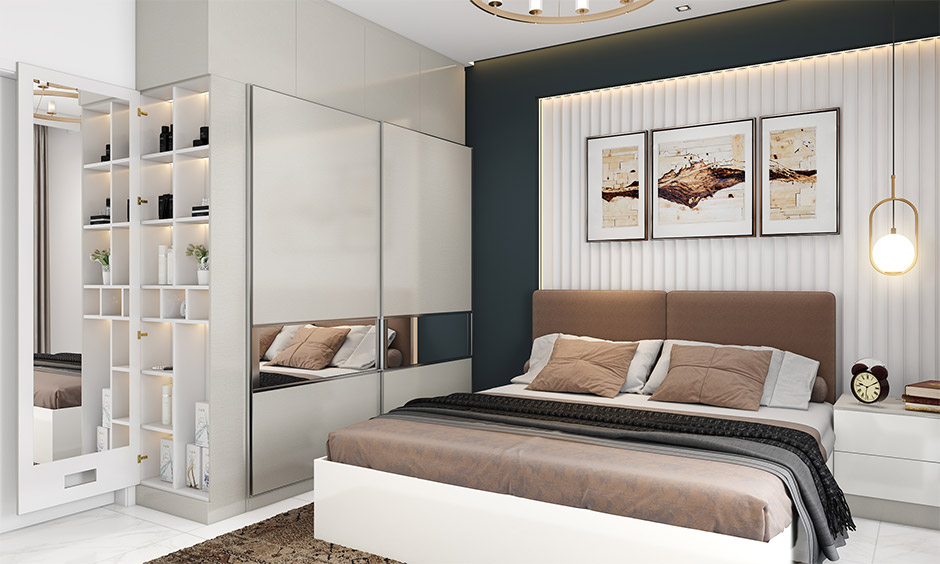 Interior design in Bhubaneswar featuring a stylish bedroom with wardrobe, space-saving shelves, and contemporary decor.