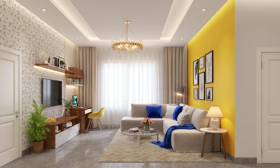 Living room with bright yellow acrylic colour for wall painting, paired with neutral décor and modern furniture.