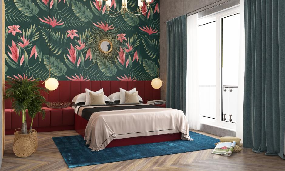Bedroom with vibrant floral accent wall, showing acrylic painting for bedroom design in bold colours.