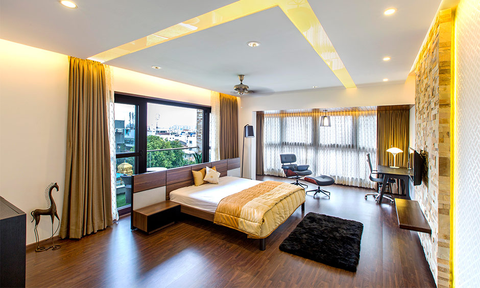 Indian brown and white two-colour bedroom wall combination for warm, balanced interiors