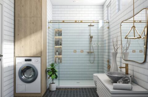 Contemporary white subway tile bathroom with brass shower fittings, floating vanity, and black hex tile flooring