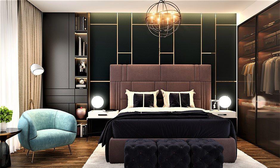 Stylish bedroom with urban wall design using tape and paint, featuring dark walls and gold accents.