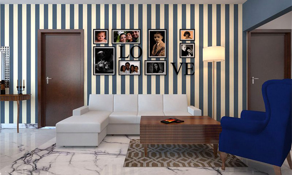 Living room with navy and cream vertical stripes created with tape, adding height and warmth.