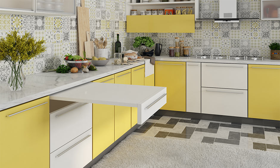 Sunlit aluminium kitchen cabinets with sleek lines and durable, stain‑resistant design.