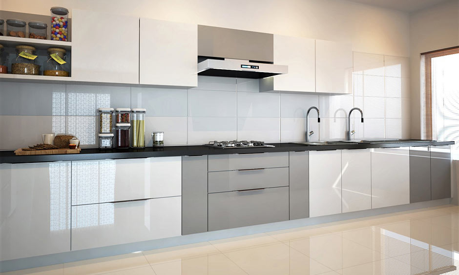 Modern grey and white aluminium kitchen cabinet with shutters, sleek and easy to clean.