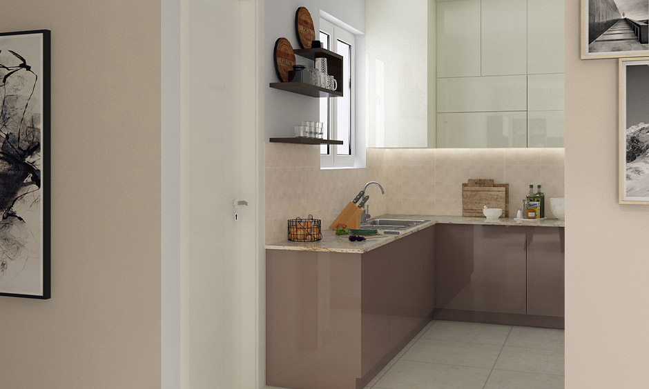 Small aluminium kitchen cabinet in a cosy corner with sleek, space‑saving design.