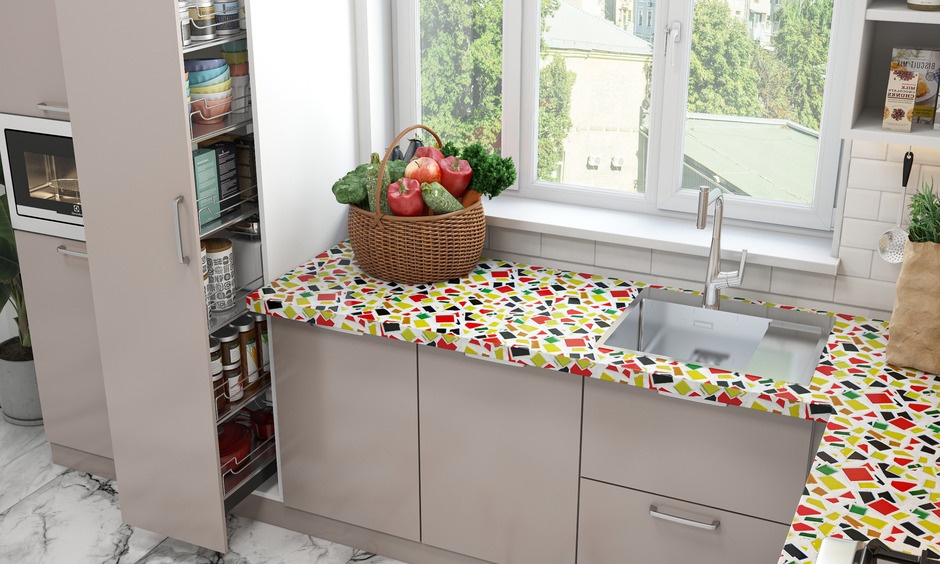 Mosaic marble kitchen countertop, which blends well with the kitchen’s interior