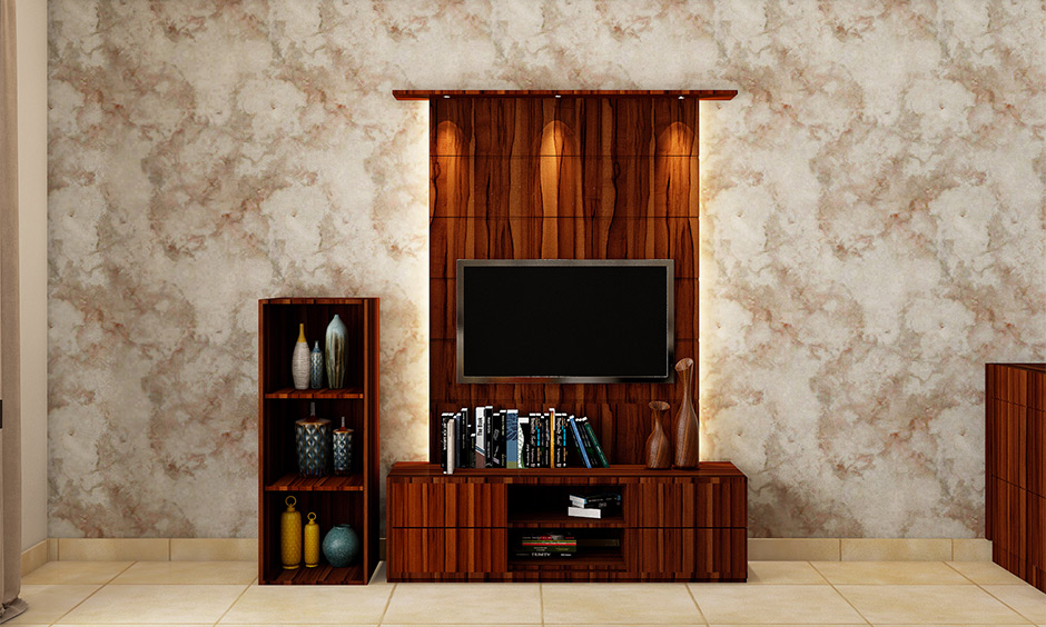L‑shaped wooden TV unit with storage cabinets and a backlit panel, ideal for a modern living room.