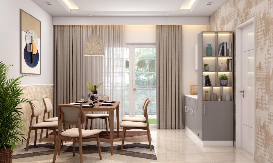 Modern dining room interior design cost in Hyderabad, which includes wooden furniture and built-in storage