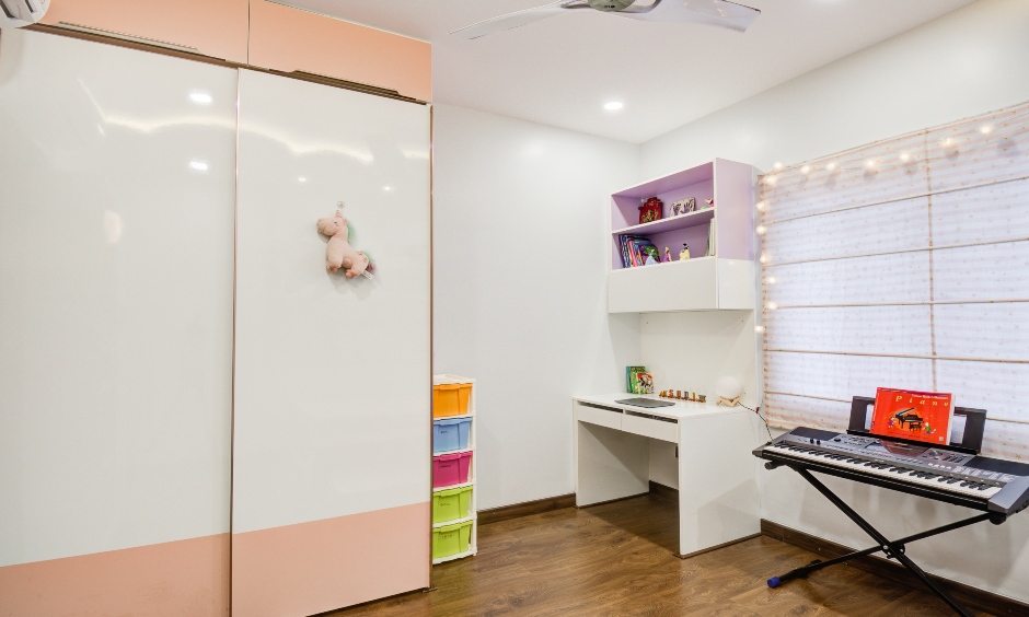 Villa kids’ room with ample wardrobe, smart study nook and piano, Narsingi Hyderabad.