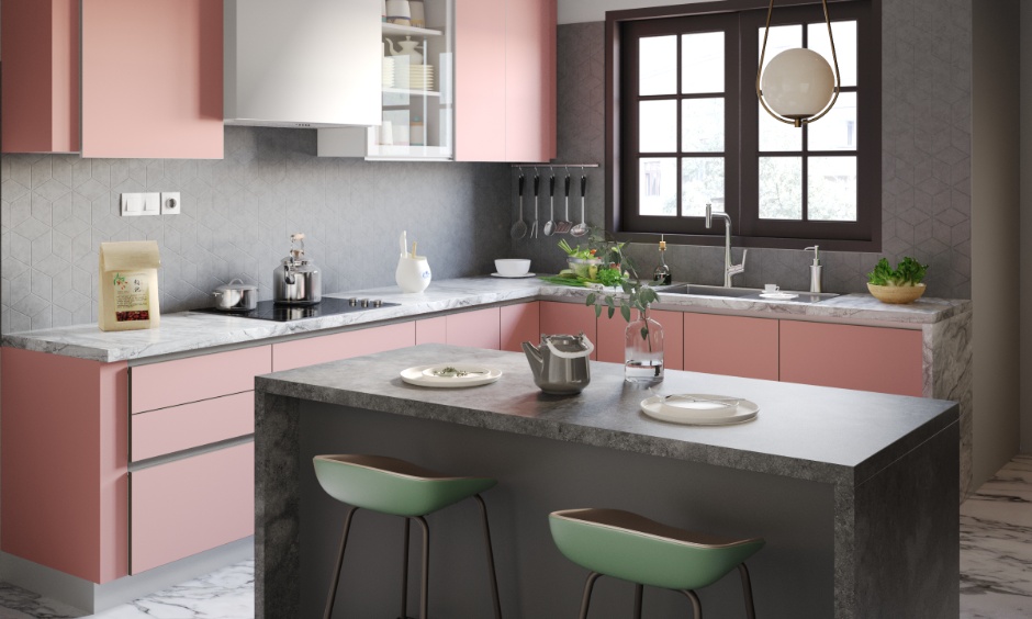 Newest kitchen colour with charcoal island and blush pink cabinets for a youthful modern look.