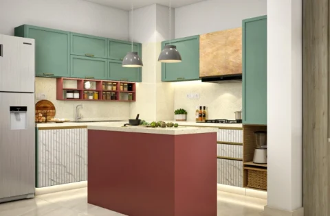 Sage green cabinets contrast with a terracotta island in this warm modular kitchen.