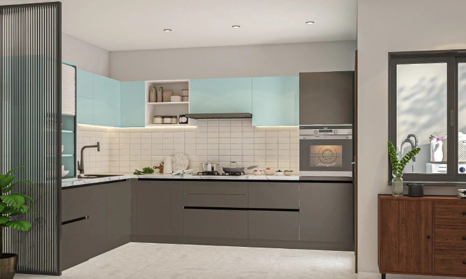 Charcoal base cabinets add visual depth beneath lighter powder blue overhead storage.