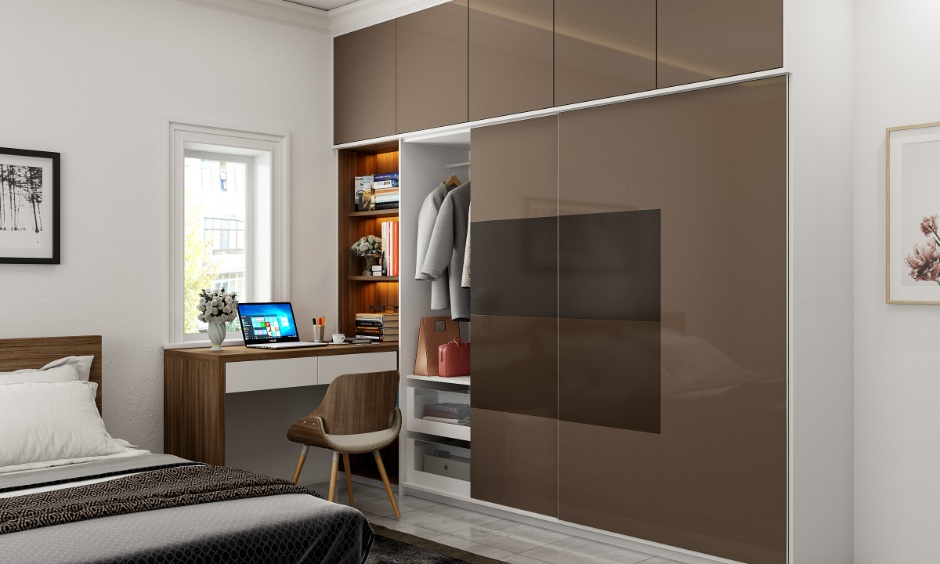 High-gloss laminate wardrobe finish reflecting light with a sleek, modern look suitable for contemporary bedrooms.