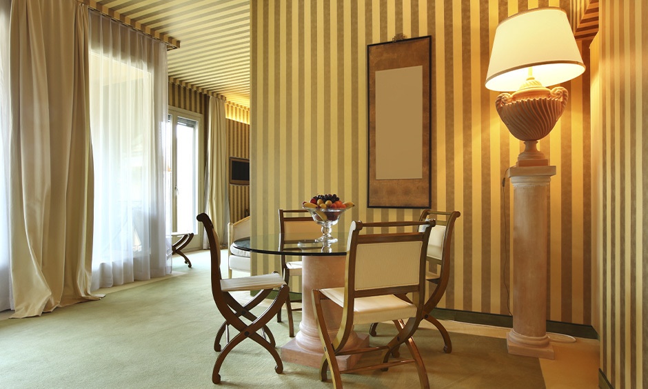 Modern wallpaper designs featuring gold metallic highlights for the dining room