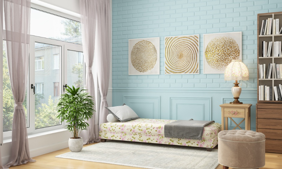Boho floral futon, which looks stylish and chic against the blue wall