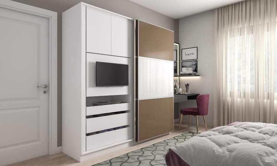 TV unit with a built-in wardrobe showing how design, materials, and finishes affect wardrobe cost beyond per square foot pricing.