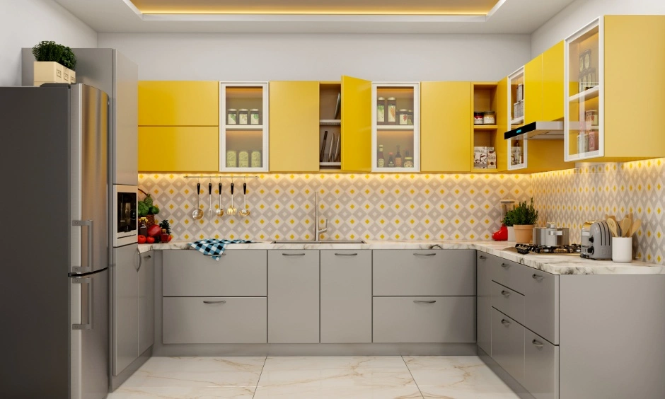 Yellow and white kitchen cabinets create contrast between base units and overhead storage.