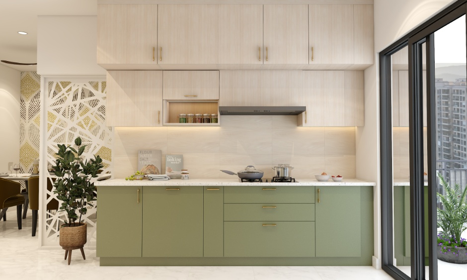 Sage green and white cabinets illustrating earth-inspired kitchen colour trends.