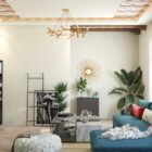 Modern living room with nature-inspired false ceiling design, wooden beams and warm ambient lighting