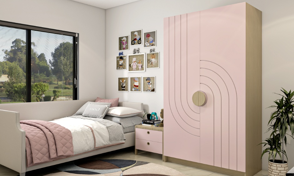 Modern kids wardrobe design complementing pink bedroom accents with functional storage