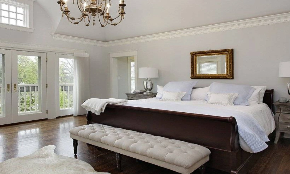 Master bedroom design for a room with wooden flooring and white walls in master bedroom wall decor