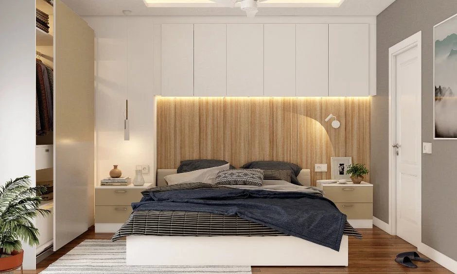Interior design cost in Chennai painting ideas with grey walls and a wood-panel headboard in a bedroom.