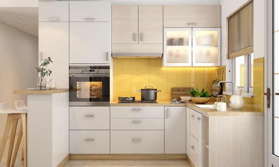 Smart modular kitchen with built-in appliances impacting overall 2BHK interior design cost in Noida
