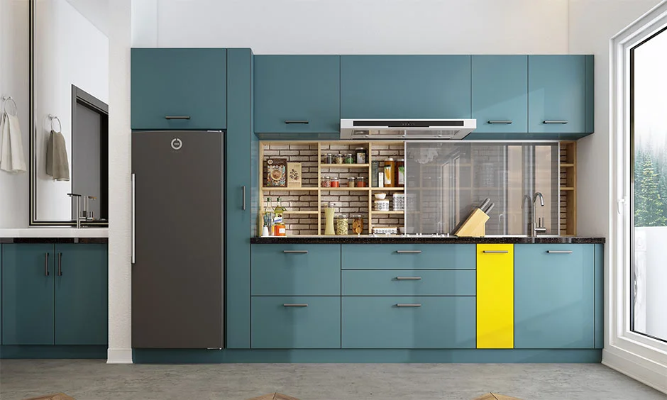 Teal and wood-finish kitchen cupboards combine contrasting colours with practical storage.