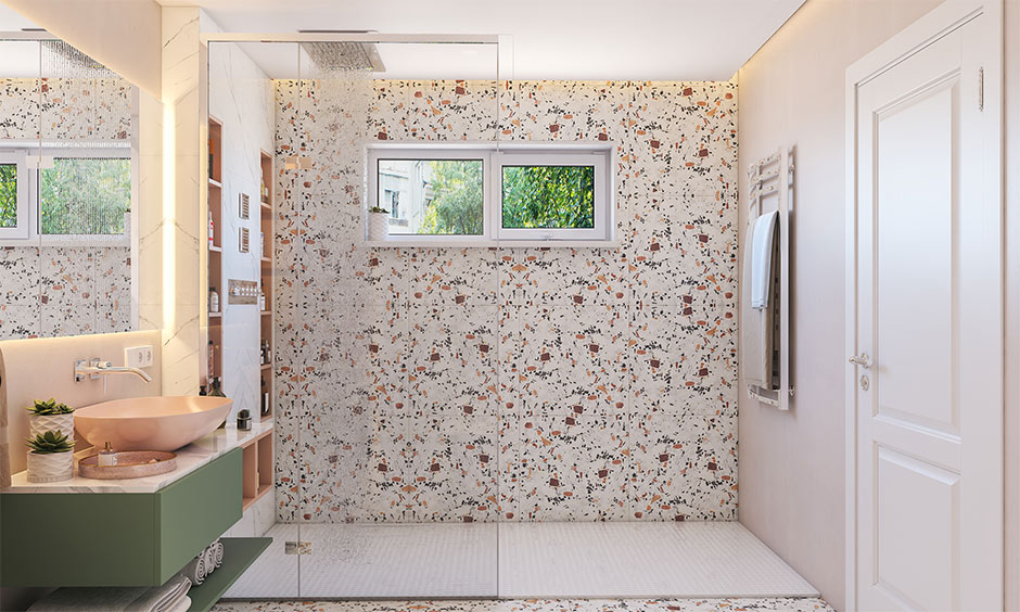 Terrazzo floor tiles styled as bathroom accent wall for a modern interior look