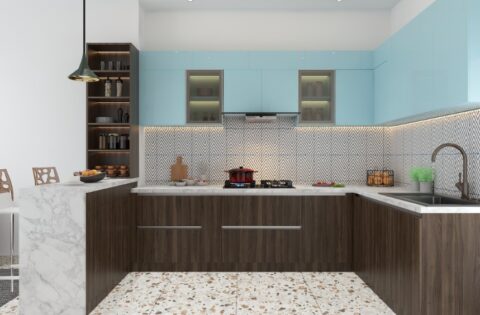 Modern L-shaped modular kitchen with marble breakfast counter showing standard kitchen dimensions and cabinet sizes