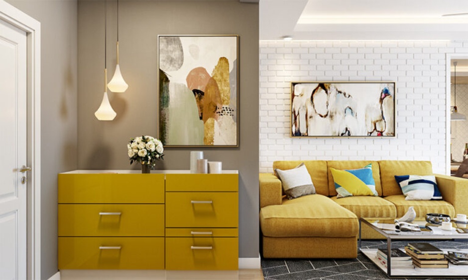 Balanced entrance wall decor using 2–3 complementary colours, consistent textures, and finishes.