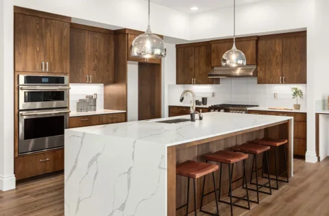 A kitchen island leaves a metre of clear walkway around all four sides for easy movement.