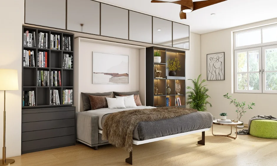 A compact 1 BHK bedroom uses space-saving furniture for a practical interior design